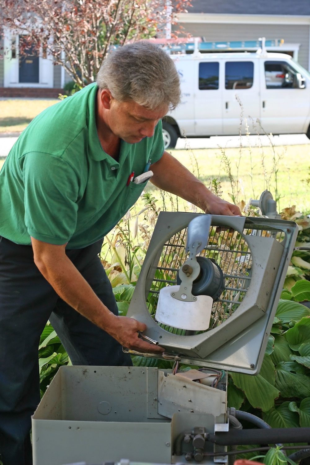 Palmetto Comfort Inc. | York County | technician repairing ac unit